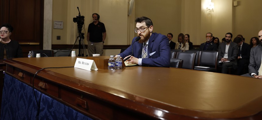 CrowdStrike Senior Vice President of Counter Adversary Operations Adam Meyers testifies at a hearing of the cybersecurity subcommittee of the House Committee on Homeland Security. A faulty update from the cybersecurity vendor led to a global technology outage over the summer that hit more than 8 million Windows devices.