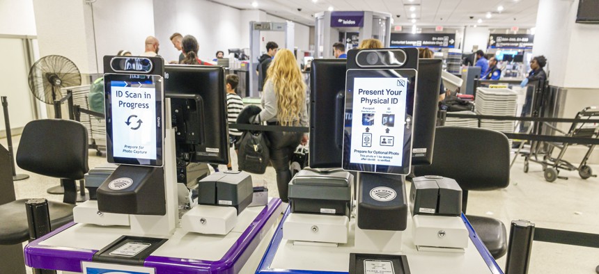 Biometric screening equipment in use at Miami International Airport in January 2024.