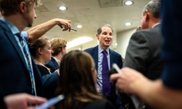 Oregon Democrat Sen. Ron Wyden, a co-sponsor of legislation to give the federal government more authority over health sector cybersecurity, talks to reporters at the Capitol .