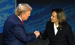  Vice President and Democratic presidential candidate Kamala Harris (right) shakes hands with former President and Republican presidential candidate Donald Trump during a presidential debate at the National Constitution Center in Philadelphia on Sept. 10, 2024. Trump has missed two deadlines for presidential transition preparation activities. 