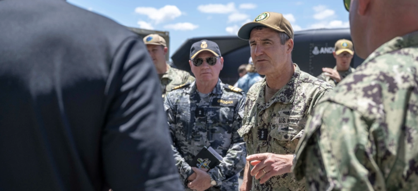 Vice Adm. Blake Converse, deputy commander of U.S. Pacific Fleet, tours an unmanned undersea vehicle static display during RIMPAC 2024 on July 18, 2024.