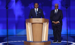 Everett Kelly, left, National President of the American Federation of Government Employees, and Imam Muhammad Abdul-Aleem deliver the Invocation during the final day of the Democratic National Convention at the United Center on Aug. 22, 2024 in Chicago, Illinois