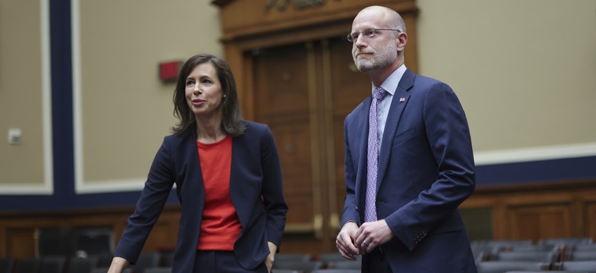 Jessica Rosenworcel (L), Chairwoman of the Federal Communications Commission (FCC), and FCC Commissioner Brendan Carr arrive to testify during a House Energy and Commerce Committee Subcommittee hearing on March 31, 2022. Both Rosenworcel and Carr skirted the question of whether the FCC would take up CALEA reform in the face of the recent Salt Typhoon hack.