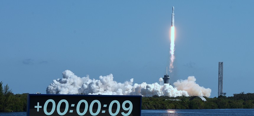 CAPE CANAVERAL, FLORIDA, UNITED STATES - OCTOBER 14: A SpaceX Falcon Heavy rocket carrying the Europa Clipper spacecraft lifts off from pad 39A at the Kennedy Space Center on October 14, 2024 in Cape Canaveral, Florida. The four-year mission will study Europa, one of Jupiter's four largest moons which is believed to have a saltwater ocean beneath its surface, hoping to discover an environment where life could exist beyond Earth