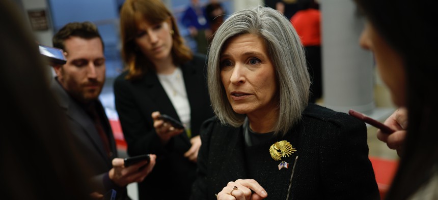 Sen. Joni Ernst, R-Iowa, speaks to reporters as she walks to a Senate luncheon at the U.S. Capitol on Nov. 19, 2024 in Washington, DC.