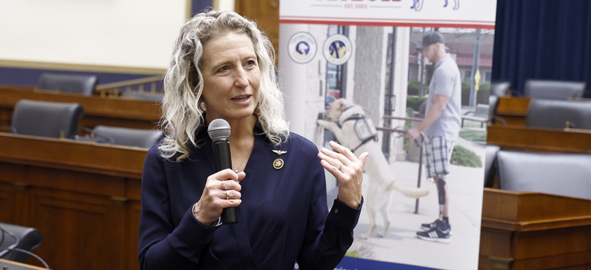 Rep. Jen Kiggans (R-VA) speaks as America's VetDogs hosts member reception to celebrate the Working Dog Commemorative Coin Act being signed into law on December 11, 2024 in Washington, DC. Kiggans introduced legislation May 19 that would require the Department of Veterans Affairs to adopt a cloud-based medical device supply chain-management system.
