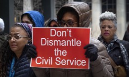 Federal employees rally in support of their jobs outside of the Kluczynski Federal Building in Chicago, on March 19, 2025. The rally was organized by the National Treasury Employees Union to voice concerns about the mass firing of federal workers by the Department of Government Efficiency (DOGE).