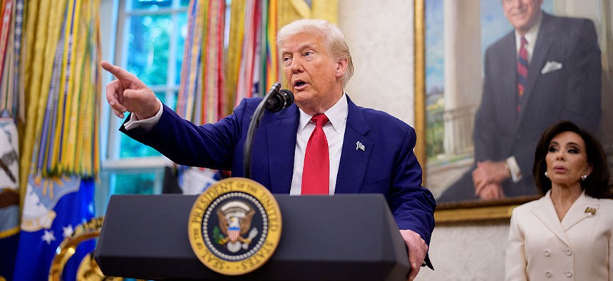 President Donald Trump takes a question during a swearing in ceremony for interim U.S. Attorney for Washington, D.C. Jeanine Pirro on May 28, 2025 in Washington, DC. Trump's proposed fiscal year 2026 budget would cut roughly 1,000 full-time employees from CISA.
