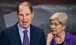 US Senator Ron Wyden, Democrat from Oregon, alongside Senator Elizabeth Warren, Democrat from Massachusetts, speaks during a news conference about protecting Social Security benefits on April 1, 2025, in Washington, DC. They joined Sens. Kirsten Gillibrand, D-N.Y., and Bernie Sanders, I-Vt., in sending a letter to the SSA head June 24 demanding answers about the agency's use of AI.