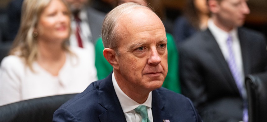 Eric Ueland, deputy director for management in the Office of Management and Budget, attends his confirmation hearing in the Senate Homeland Security and Governmental Affairs Committee on Thursday, April 3, 2025. Ueland said July 17 he wants to keep CIOs from being 