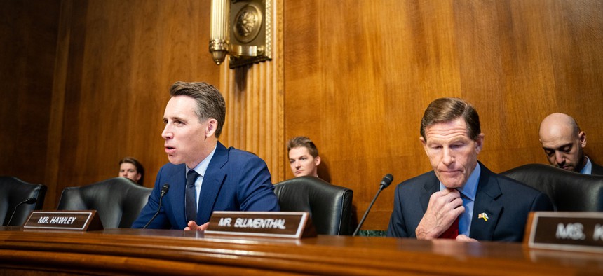 Sen. Josh Hawley (R-MO) and Sen. Richard Blumenthal (D-CT) are seen at the start of a hearing on 