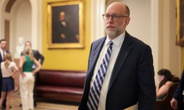 Office of Management and Budget Director Russell Vought on his way to meet with Republican lawmakers at the U.S. Capitol on June 25, 2025. OMB released new legal guidance arguing that the back pay law applied only to the 2019 shutdown.