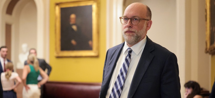 Office of Management and Budget Director Russell Vought on his way to meet with Republican lawmakers at the U.S. Capitol on June 25, 2025. OMB released new legal guidance arguing that the back pay law applied only to the 2019 shutdown.