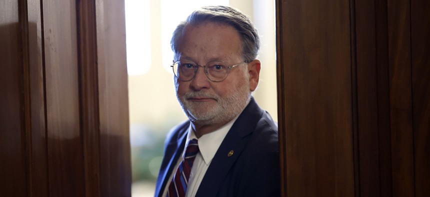 Sen. Gary Peters (D-MI) leaves a Senate Democratic meeting at the U.S. Capitol Building on October 3, 2025 in Washington, DC.