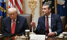 Defense Secretary Pete Hegseth speaks alongside President Donald Trump during a cabinet meeting at the White House on Dec. 2, 2025.