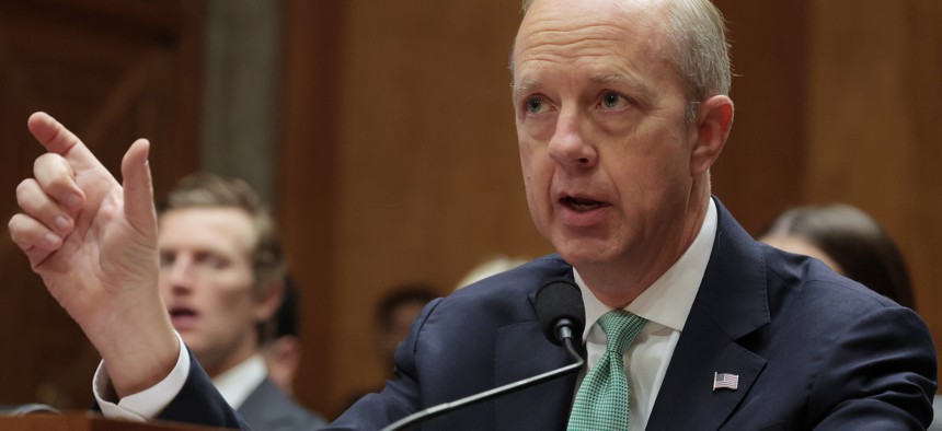 Eric Ueland, deputy director for management at the Office of Management and Budget, speaks during a hearing on Capitol Hill on April 3. Ueland said in a Monday statement that the President's Management Agenda "helps ensure we carry out the President's vision to deliver an effective and efficient Government directly accountable to all Americans.”