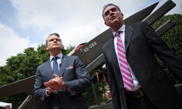 Defense Undersecretary (Research & Engineering) Emil Michael, right, briefs Defense Secretary Pete Hegseth on the XQ-58A Valkyrie drone at the Pentagon on July 16, 2025. 