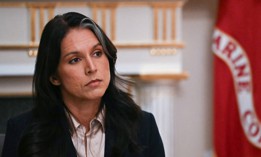 US Director of National Intelligence Tulsi Gabbard listens as President Donald Trump speaks during a Cabinet Meeting in the Cabinet Room of the White House in Washington, DC on December 2, 2025.