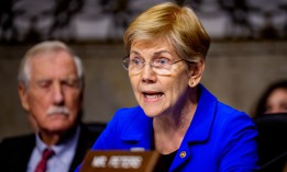 Sen. Elizabeth Warren (D-MA), accompanied by Sen. Angus King (I-ME) (L), speaks at a Senate Committee on Armed Services hearing on Capitol Hill on December 11, 2025 in Washington, DC.