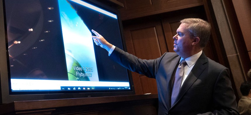 U.S. Deputy Director of Naval Intelligence Scott Bray explains a video of an unidentified aerial phenomena as he testifies before a House Intelligence Committee subcommittee hearing at the U.S. Capitol on May 17, 2022 in Washington, DC. 