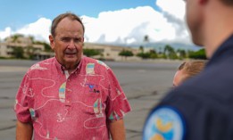 Bob Stephenson, U.S. Indo-Pacific Command's director of requirements and resources, gets briefed about a semi-autonomous aircraft at Joint Base Pearl Harbor-Hickam, Hawaii, on July 28, 2025. 