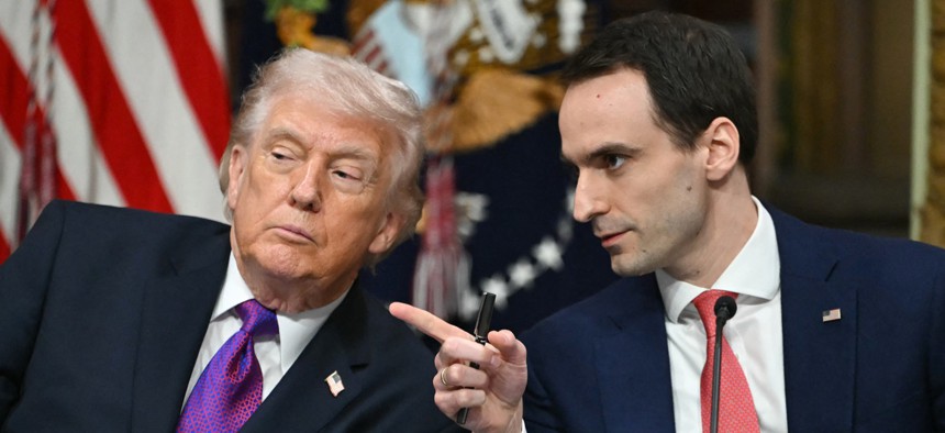 President Donald Trump speaks with Michael Kratsios, director of the White House Office of Science and Technology Policy, during a roundtable on Ratepayer Protection Pledge in the Indian Treaty Room at the Eisenhower Executive Office Building on the White House campus in Washington, DC on March 4, 2026.