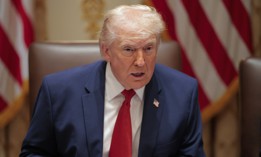 President Donald Trump speaks during a Cabinet meeting at the White House on March 26. The same day he signed an executive order dealing with diversity, equity and inclusion programs at federal contracting companies. 