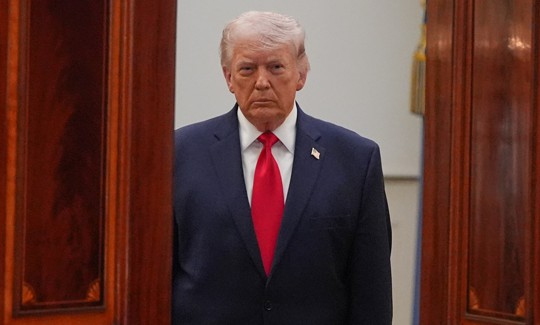 President Donald Trump arrives to address the nation from the Cross Hall of the White House on April 1, 2026 in Washington, DC.