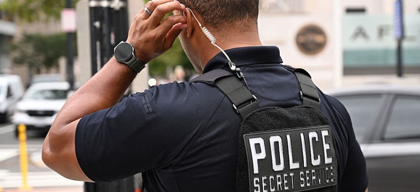 A US Secret Service officer works a checkpoint near the White House ahead of the meeting between Ukrainian President Volodymyr Zelensky, European leaders and US President Donald Trump in Washington, DC, on August 18, 2025.