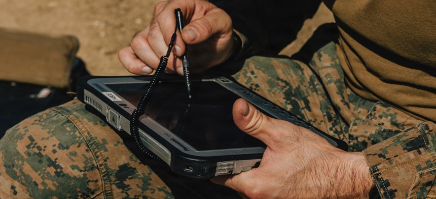 A U.S. Marine of the 22nd Marine Expeditionary Unit (Special Operations Capable) flies an R80D SkyRaider drone at Camp Santiago, Puerto Rico, on Dec. 14, 2025.