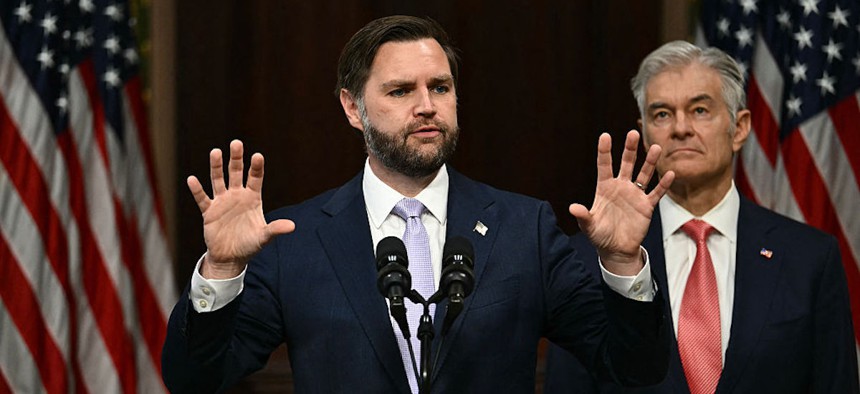 Vice President JD Vance speaks alongside Administrator for the Centers for Medicare and Medicaid Services Mehmet Oz during a press conference on anti-fraud initiatives at the Eisenhower Executive Office building on the White House campus in Washington, DC, on May 13, 2026.