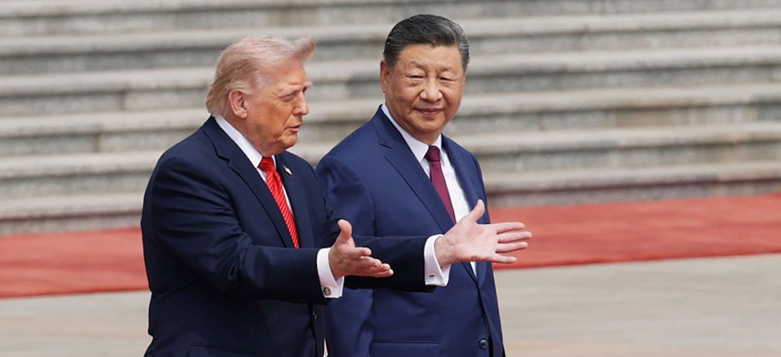 U.S. President Donald Trump and Chinese President Xi Jinping attend a welcome ceremony at the Great Hall of the People on May 14, 2026 in Beijing, China.