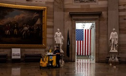 A maintenance worker pushes a cleaning cart through the rotunda of the U.S. Capitol on September 30, 2025 in Washington, D.C.