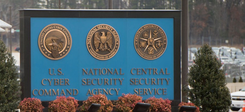 A sign for the National Security Agency (NSA), US Cyber Command and Central Security Service, is seen near the visitor's entrance to the headquarters of the National Security Agency (NSA) in Fort Meade, Maryland, February 14, 2018.