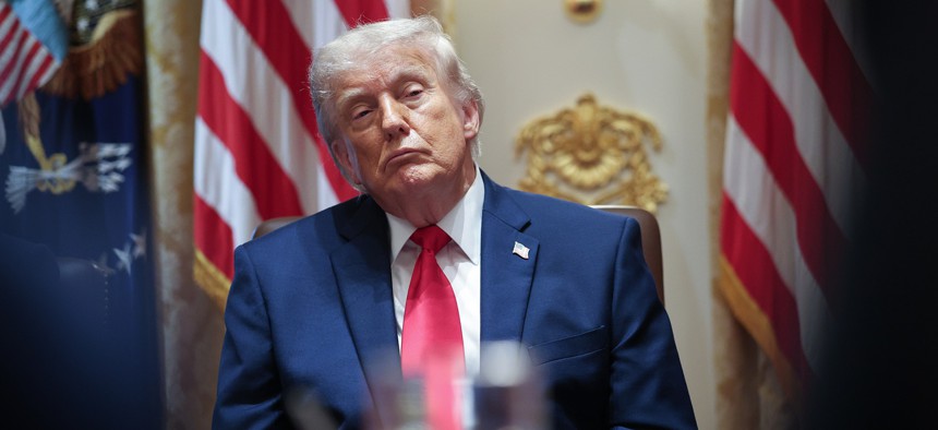 U.S. President Donald Trump listens to members of his Cabinet speak during a meeting in the Cabinet Room of the White House on May 27, 2026 in Washington, DC.