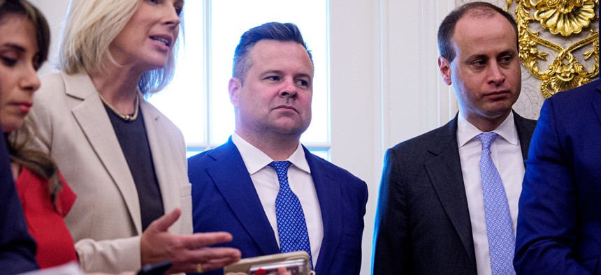 Acting Director of National Intelligence Bill Pulte (C) attends an event with U.S. President Donald Trump in the Oval Office of the White House on June 22, 2026 in Washington, DC.