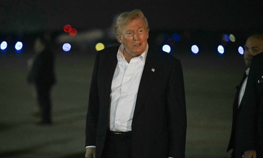 President Donald Trump walks toward his motorcade after he arrived at Joint Base Andrews, Maryland on July 9, 2026.