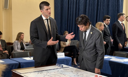 Rep. Shri Thanedar, D-Mich. of the House Homeland Security Committee gets an overview of the CSIS war game simulating AI-cyber threats involving China and Taiwan.