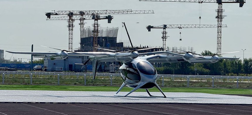 An AutoFlight 'Prosperity' electric vertical take-off and landing (eVTOL) aircraft is demonstrated during a flight presentation organized by Alatau Advanced Air Group (AAAG) in cooperation with China's AutoFlight at the Kazanat Hippodrome in Astana, Kazakhstan, on July 24, 2026. Kazakhstan is preparing to become the first country in Central Asia to integrate electric vertical take-off and landing (eVTOL) air taxis into its transportation system.