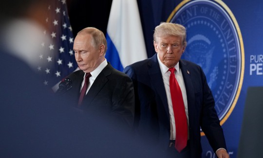 U.S. President Donald Trump (R) and Russian President Vladimir Putin arrive for a press conference at Joint Base Elmendorf-Richardson on August 15, 2025 in Anchorage, Alaska. 