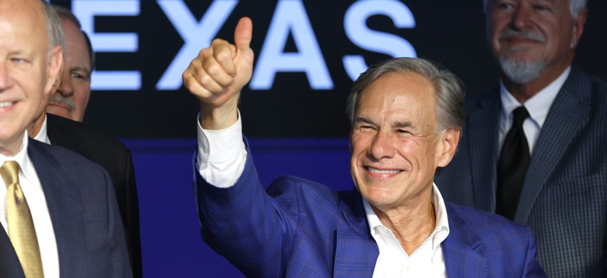 Texas Governor Greg Abbott gives a thumbs up to supporters before ringing the closing bell to celebrate the grand opening of NYSE Texas on August 27, 2026 in Dallas, Texas.