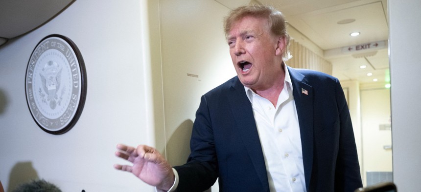 US President Donald Trump speaks to the press aboard Air Force One while flying to Joint Base Andrews, Maryland from Ireland on September 13, 2026.