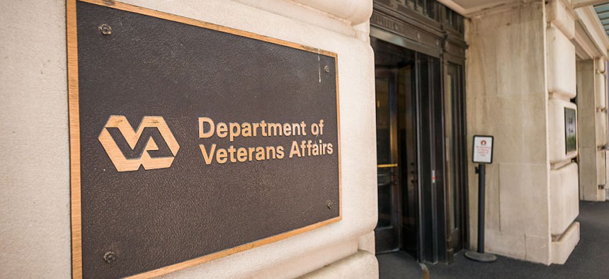A bronze plaque marks the main entrance to the U.S. Department of Veterans Affairs headquarters building on July 23, 2026, in Washington, DC.