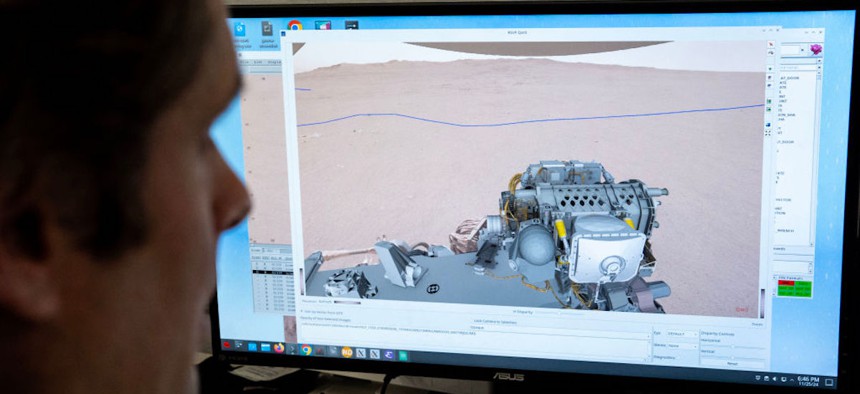 Perseverance rover driver Joseph Carsten plans NASA's Perseverance Mars rover's route for the next Mars mission day at the Jet Propulsion Laboratory, JPL, in Pasadena, California on Monday November 25, 2024.
