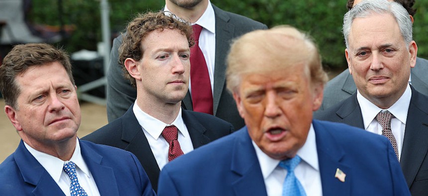 : (L-R) U.S. Director of National Intelligence Jay Clayton, CEO of Meta Platforms Mark Zuckerberg, Co-Founder at Anthropic Tom Brown, U.S. President Donald Trump and David O. Sacks hold a press briefing with AI executives following a meeting on artificial intelligence, outside the West Wing of the White House on September 29, 2026 in Washington, DC. The meeting came as some have called for a slowdown in AI development amid rising safety concerns. 