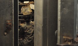A Marine searches for frozen Commissary items in a CATC Camp Fuji mess hall freezer in March 2023.