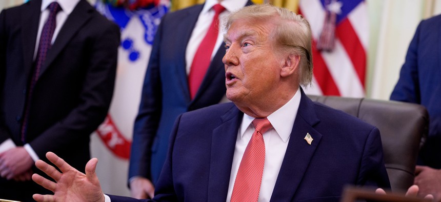 U.S. President Donald Trump speaks during an event in the Oval Office of the White House on October 20, 2026 in Washington, DC.