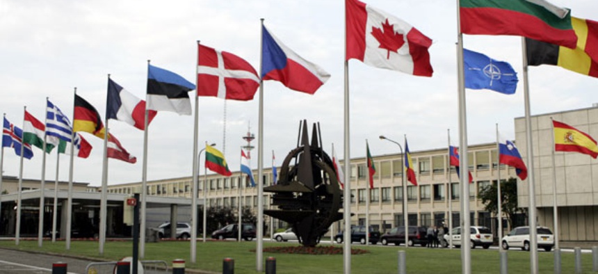 Flags fly at NATO headquarters in Brussels.