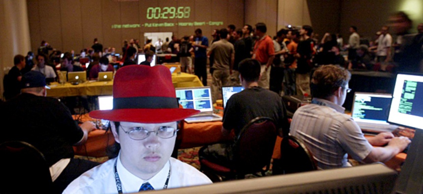 Jason Spence competes in a hacking competition at the DEFCON 14 Conference in Las Vegas.
