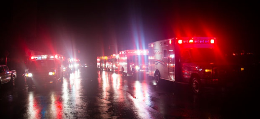 Ambulances wait outside New York University Tisch Hospital during the storm.